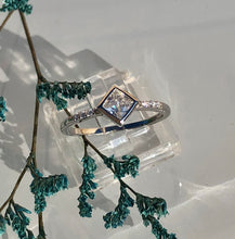 Load image into Gallery viewer, This ring is truly unique. Our Diamond Solitaire Ring adds just the right touch to any outfit for any occasion.      925 sterling silver with 3 layers of rhodium plating     Diamond is AAAA cubic zirconia