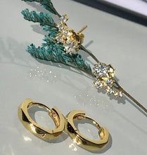 Load image into Gallery viewer, Our Diamond Star Cluster Earrings are fun and playful, while still being beautiful and elegant. They can be worn alone or paired with other hoops or studs to create a carefree effortless look.       925 sterling silver with 14K gold or rose gold plating     Diamonds are AAAA cubic zirconia