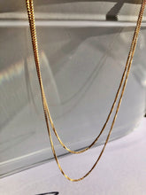 Load image into Gallery viewer, Our Double Layered Classic Chain Necklace is a staple accessory. Wear it on its own for an effortless layered look or paired with your favorite necklace. You can change the look by adding your favorite charm too. Jewelry that is 925 sterling silver with 18K gold plating 16 inches for first layer and 18 inches for the second layer with 2 inch extender