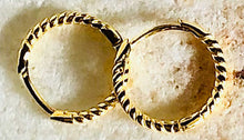 Load image into Gallery viewer, Our dainty Twist Huggie Hoop Earrings are the earrings you never knew you needed. They give just the right shine to wear alone, but are dainty enough to wear with any earring stack. They are a must have and made from durable material to withstand daily wear. Jewelry that is 925 sterling silver with platinum or 18K gold plating very light weight and hypoallergenic
