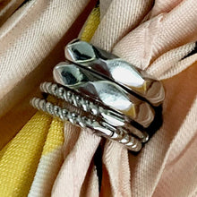 Load image into Gallery viewer, Our dainty Twist Huggie Hoop Earrings are the earrings you never knew you needed. They give just the right shine to wear alone, but are dainty enough to wear with any earring stack. They are a must have and made from durable material to withstand daily wear. Jewelry that is 925 sterling silver with platinum or 18K gold plating very light weight and hypoallergenic