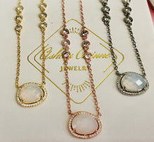 Load image into Gallery viewer, Our Moonstone Pendant Necklace is a beautiful statement piece that will get attention. Just because it can hold its beauty on its own don't shy away from adding your favorite necklaces with it to create an unique style. Jewelry that is 925 sterling silver or 925 sterling silver with 14K gold or rose gold plating 18 inches with 2 inch extender Stones are moonstone and AAA cubic zirconia