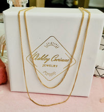 Load image into Gallery viewer, Our Double Layered Classic Chain Necklace is a staple accessory. Wear it on its own for an effortless layered look or paired with your favorite necklace. You can change the look by adding your favorite charm too. Jewelry that is 925 sterling silver with 18K gold plating 16 inches for first layer and 18 inches for the second layer with 2 inch extender