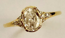 Load image into Gallery viewer, Our Oval Diamond Ring is a beautiful statement ring that shines best on its own. It is sure to get attention with its perfect balance of modern and vintage. You wont ever want to take it off! Jewelry that is 925 sterling silver with 18K gold plating AAAA cubic zirconia