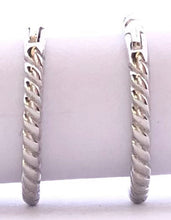 Load image into Gallery viewer, Our dainty Twist Huggie Hoop Earrings are the earrings you never knew you needed. They give just the right shine to wear alone, but are dainty enough to wear with any earring stack. They are a must have and made from durable material to withstand daily wear. Jewelry that is 925 sterling silver with platinum or 18K gold plating very light weight and hypoallergenic
