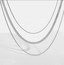 Load image into Gallery viewer, What the layered look instantly? We got you with our triple layer necklace. Be on trend with out the hassle. Your never going to want to take it off!