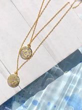 Load image into Gallery viewer, These star and moon necklaces were made to be layered with. The stones add just the right amount of sparkle. They are 14k gold plated stainless steel allowing them to be water resistant. So wear them all day everyday without worry!