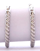 Load image into Gallery viewer, Our dainty Twist Huggie Hoop Earrings are the earrings you never knew you needed. They give just the right shine to wear alone, but are dainty enough to wear with any earring stack. They are a must have and made from durable material to withstand daily wear. Jewelry that is 925 sterling silver with platinum or 18K gold plating very light weight and hypoallergenic
