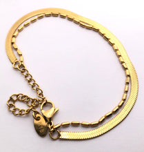 Load image into Gallery viewer, This mixed chain bracelet is stunning on it’s own. It adds style effortlessly to any outfit. It can easily elevate any bracelet stack. It’s a must have piece and it’s water resistant, so you know it will always look great!   18k gold plated stainless steel  6in with 2in extender 
