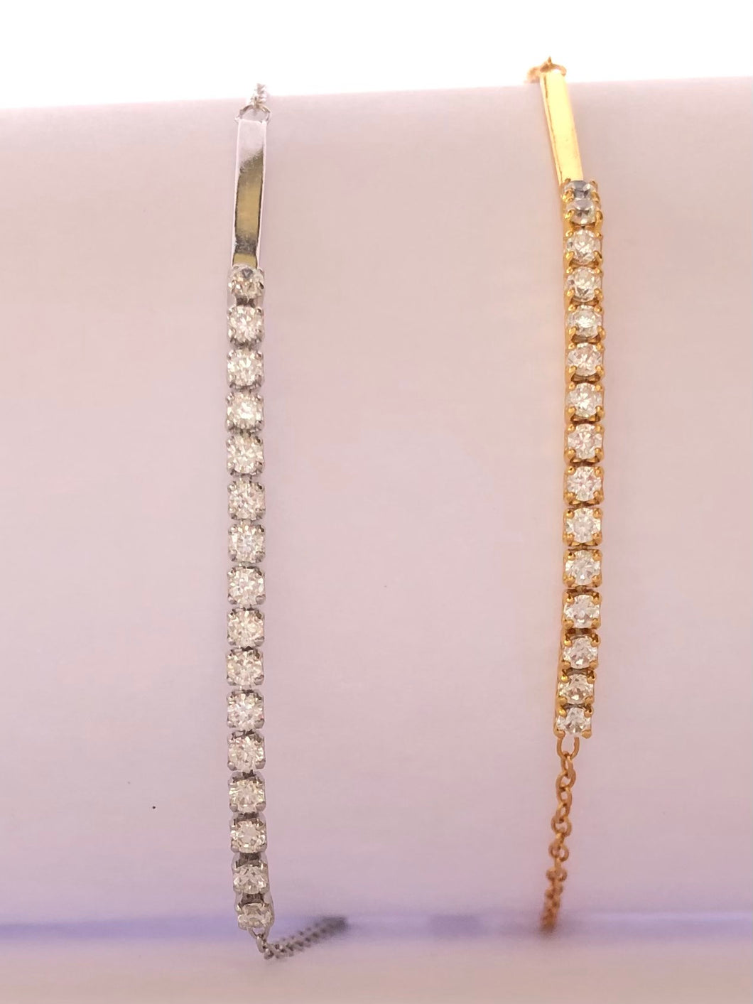 Simple Diamond Chain Bracelet 925 Sterling Silver with platinum or 18K gold plating     Diamonds are AAAA cubic zirconia     Two sizes available 6.5 or 7.5 inches long plus extender